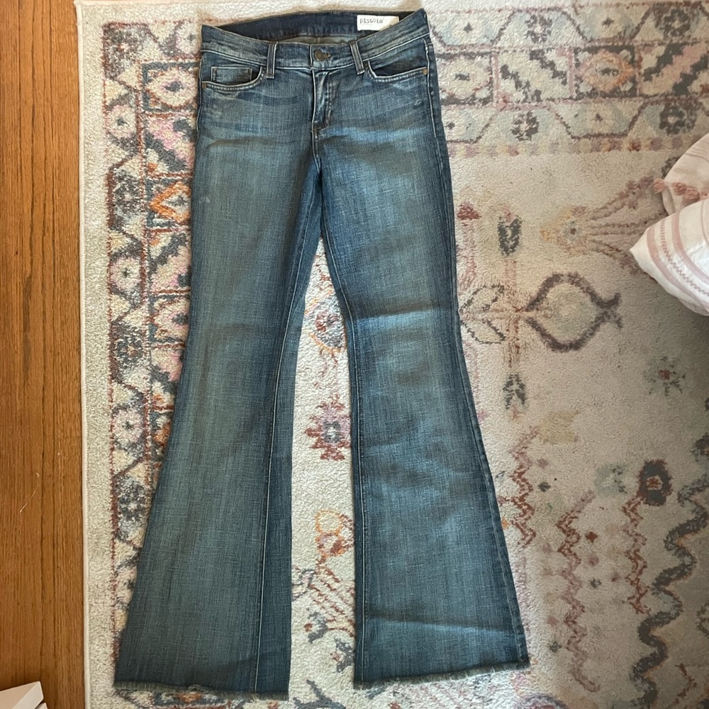 Distressed flare jeans